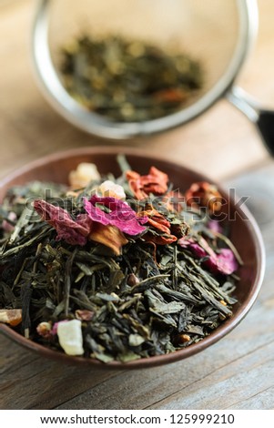 Green Tea Leaves with fruit and rose petals