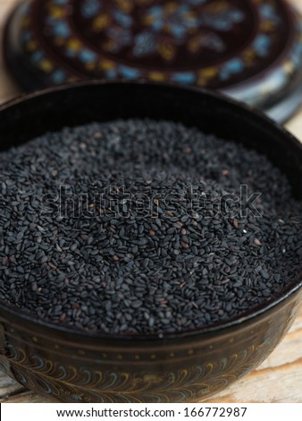 Black sesame seeds in a bowl