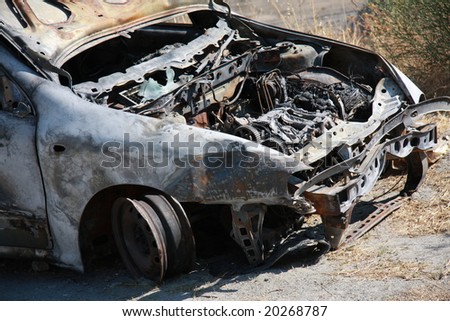 Abandoned burnt out car