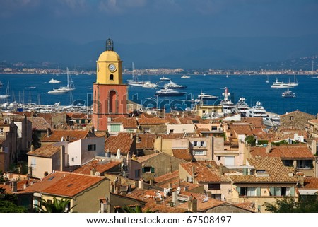 stock photo Saint Tropez France skyline with clock tower and marina
