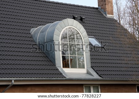 Dormer window of a house, Denmark, Europe