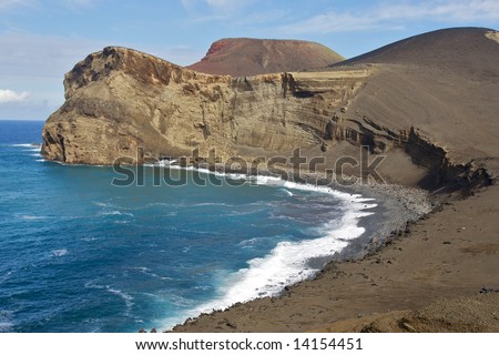 The capelinhos volcano on the Faial island of the Portuguese Azores archipelago with a piece of the island formed after the 1953 volcanic eruption