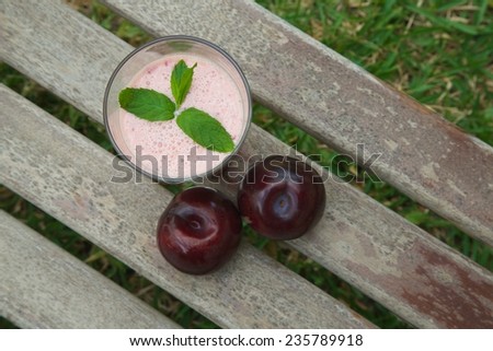 A glass of plum smoothie. Top view