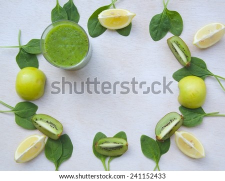 Detox green smoothie ingredients: kiwi, green apple,spinach,lemon - background. Free space for a text.
