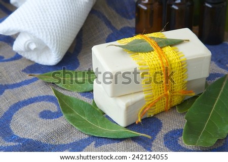 Bay leaf soap. Bay leaves in the background,