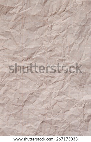 A piece of jammed and distressed graph paper. Background