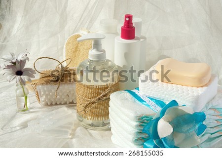 Hygiene set for a baby: liquid soap,cotton sticks,shower,diapers,cosmetic discs,soap,gel,lotion,antiseptic,physiological liquid.