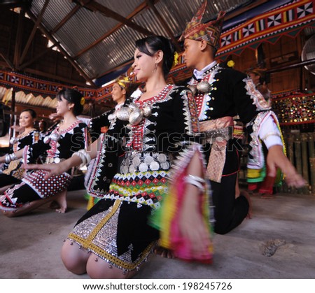 KOTA KINABALU, MALAYSIA - MAY 30 : Dancers in traditional Tindal costume perform for the public during Harvest Festival celebration May 30, 2013 in Kota Kinabalu, Sabah, Malaysia.