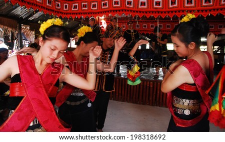 KOTA KINABALU, MALAYSIA - MAY 30 : Dusun Tindal in Rinagang traditional costume dance for the public during Harvest Festival celebration May 30, 2014 in Kota Kinabalu, Sabah, Malaysia.