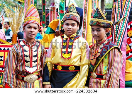 Kota Belud, Sabah, Malaysia, Okt 18, 2014 : Youngster from the Bajau and Iranun ethnic wearing their traditional costume and headdress for  the 4th Usunan Festival competition in Kota Belud.