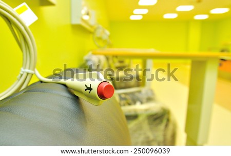 Assistance button as a medical facility at an asthma bay