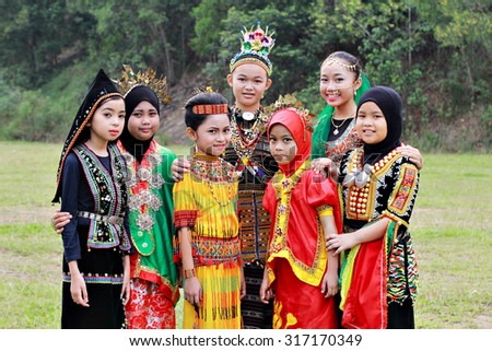 Kota Kinabalu, Sabah. September 15, 2015: School children attending school in their multiracial traditional costumes to celeberate Malaysia Day at SK. Kolombong, Kota Kinabalu, Sabah, Malaysia.