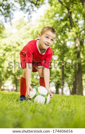 A young boy loves his soccer