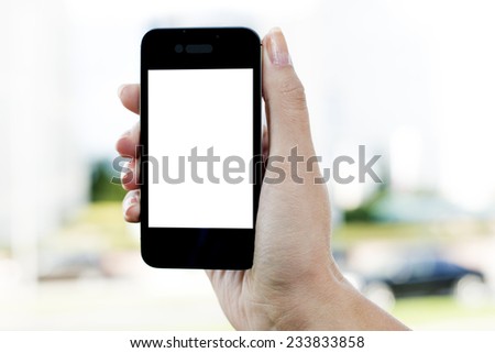 Woman hand holding blank white screen smart phone