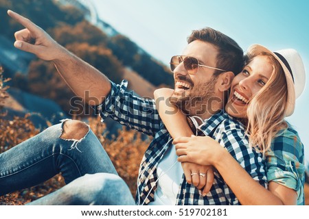 Romantic young couple having fun in the park.