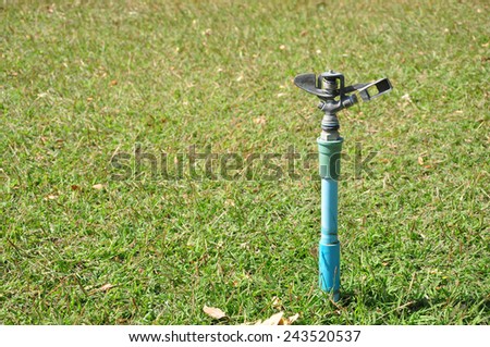 lawn sprinkler head water the grass