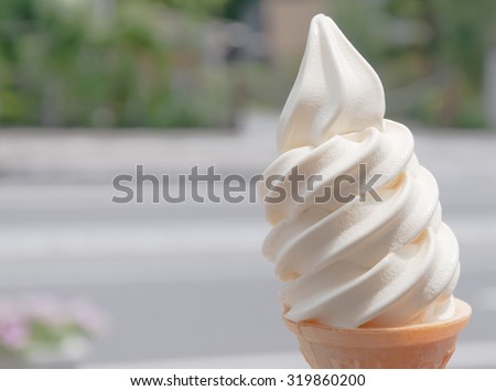 soft butter ice cream on cone, selective focus