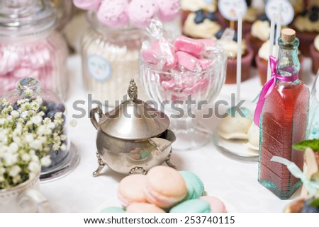 candy bar at a wedding in the style of Alice in Wonderland