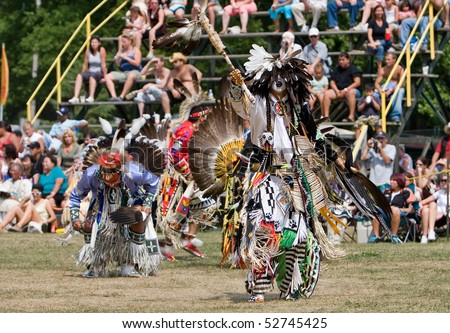 OHSWEKEN, ONTARIO, CANADA - JULY 27: Traditional dancers performs during the Grand River Champion of Champions Powwow July 27, 2008 in Ohsweken, Ontario, Canada.