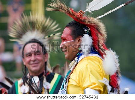 OHSWEKEN, ONTARIO, CANADA - JULY 27: Traditional dancers waiting for their dance to start during the Grand River Champion of Champions Powwow July 27, 2008 in Ohsweken, Ontario, Canada.