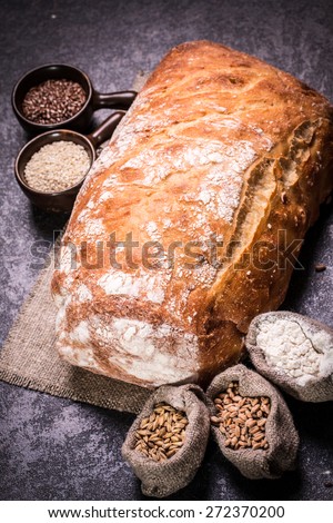 loaf of bread on stone background, food closeup