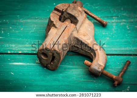 Old tools on wooden table