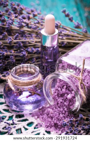 lavender flower,oil,salt, spa beauty concept. wood old background.