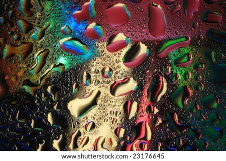 Multi-coloured drops of water