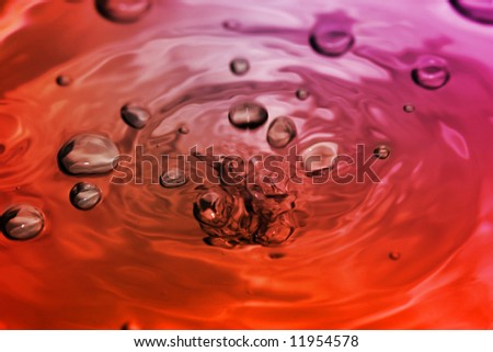 Bubbles motion in colored water. Abstract background. Close-up.