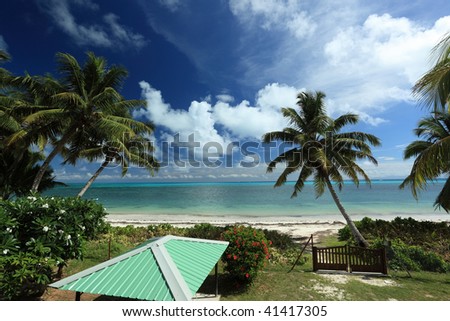 Seychelles seascape. Villa's gate to ocean.Praslin island
