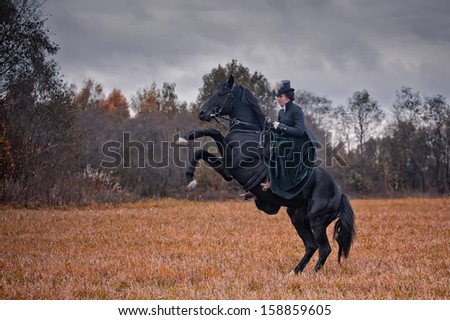 MOZHAISK, MOSCOW- OCTOBER 5,  2013: Historical reconstruction of famous Russian hounds hunting by horse club \