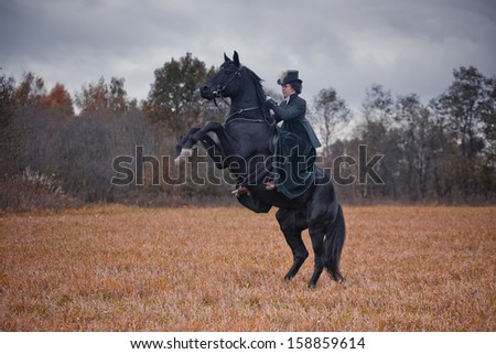 MOZHAISK, MOSCOW- OCTOBER 5,  2013: Historical reconstruction of famous russian hounds hunting by horse club 