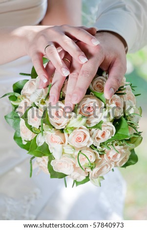 Hands of married couple