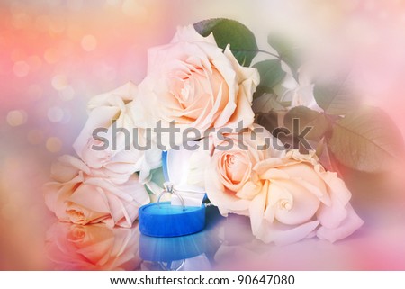 Peach roses with diamond ring in a box on soft background with bokeh in watercolor look