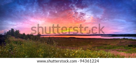 Summer panoramic landscape with river valley at sunset