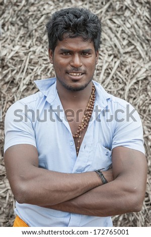KERALA, INDIA - NOVEMBER 26 ; Unidentified Indian man smile and poses for camera in Kerala, India on November 26, 2011