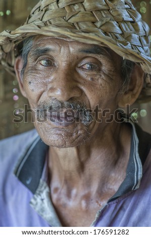Bali, Indonesia - May 9: Portrait Of Unidentified Old Man To Bali Island. Inhabitants Of Bali Are Kind And Friendly Even In Old Age On May 9, 2012 In Bali, Indonesia