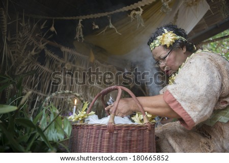 CAREY ISLAND, SELANGOR,MALAYSIA - MARCH 1,2014 :A member of Malaysia\'s Mah Meri tribe participates in a ritual for Ari Muyang festival in Sungai Bumbum village at Pulau Carey Island, Klang, Malaysia.