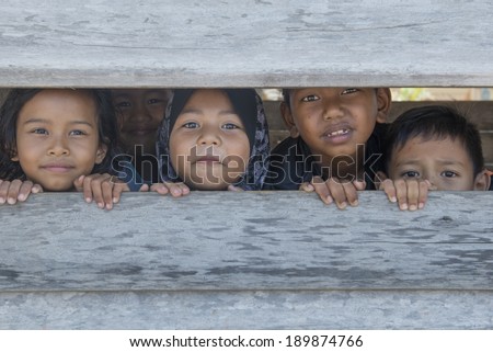TERENGGANU, MALAYSIA - APRIL 9, 2014: Portrait of an unidentified Malay ethnic in Terengganu, Malaysia. The Malays, make up Malaysia\'s largest ethnic group, which is more than 50% of the population.
