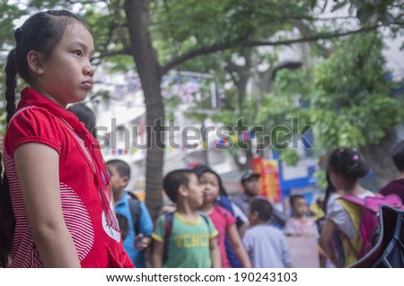 HANOI, VIETNAM - MAY 24: Unidentified school kids after school break in Hanoi, Vietnam on May 24, 2011. Education is free in Vietnam for kids aged 6-11 years old.