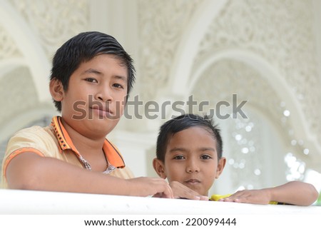 TERENGGANU, MALAYSIA - SEPTEMBER 20, 2014: Portrait of an unidentified Malay ethnic in Terengganu,Malaysia. The Malays,make up Malaysia\'s largest ethnic group, which is more than 50% of the population