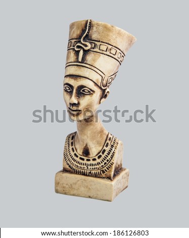 Bust of the queen of Egypt Nefertiti in the imperial clothes, looking in a distance.