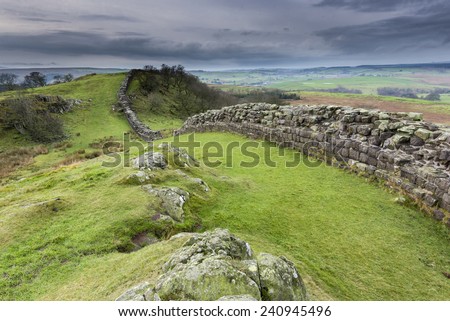 Hadrian\'s wall built by Roman\'s to protect northern borders of British Isle was extending from west coast to east coast of the Great Britain. Remainings of the wall near Walton Quarry, Northumberland