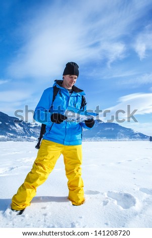 Man in winter clothing traveling in the mountains area