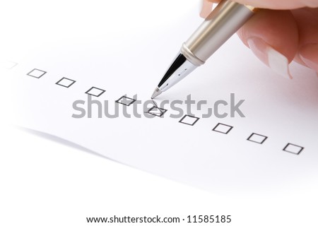 Woman hand marking a check box