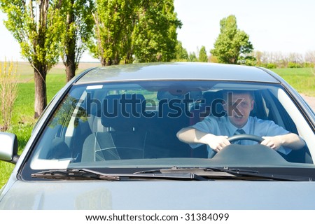 stock photo : Novice driver in a car