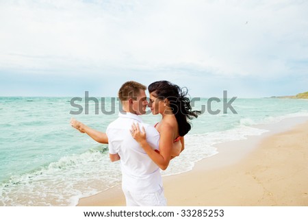 A loving couple enjoying their time together at the beach
