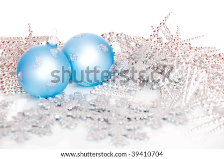 Blue Christmas balls among silver glittering decoration