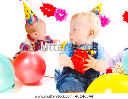 Babies playing at the birthday party