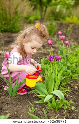 Girl Watering Flowers